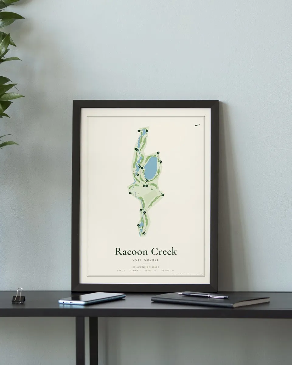 Racoon Creek golf course map print framed on a wall